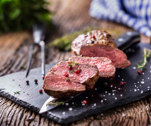 Beef Steak. Roasted Beef Steak With Salt Pepper Thyme On Rustic Wooden Table